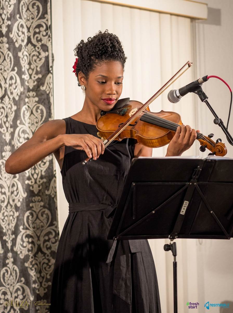 Violinist — Abigail Cooper performing